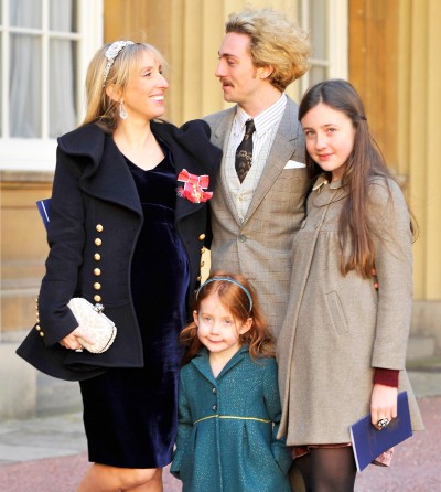 A photo of Aaron with his wife Sam and children.